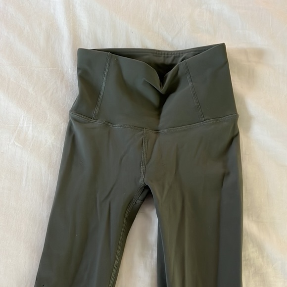 Green Lululemon high waisted leggings with zipper back pocket - Picture 2 of 6